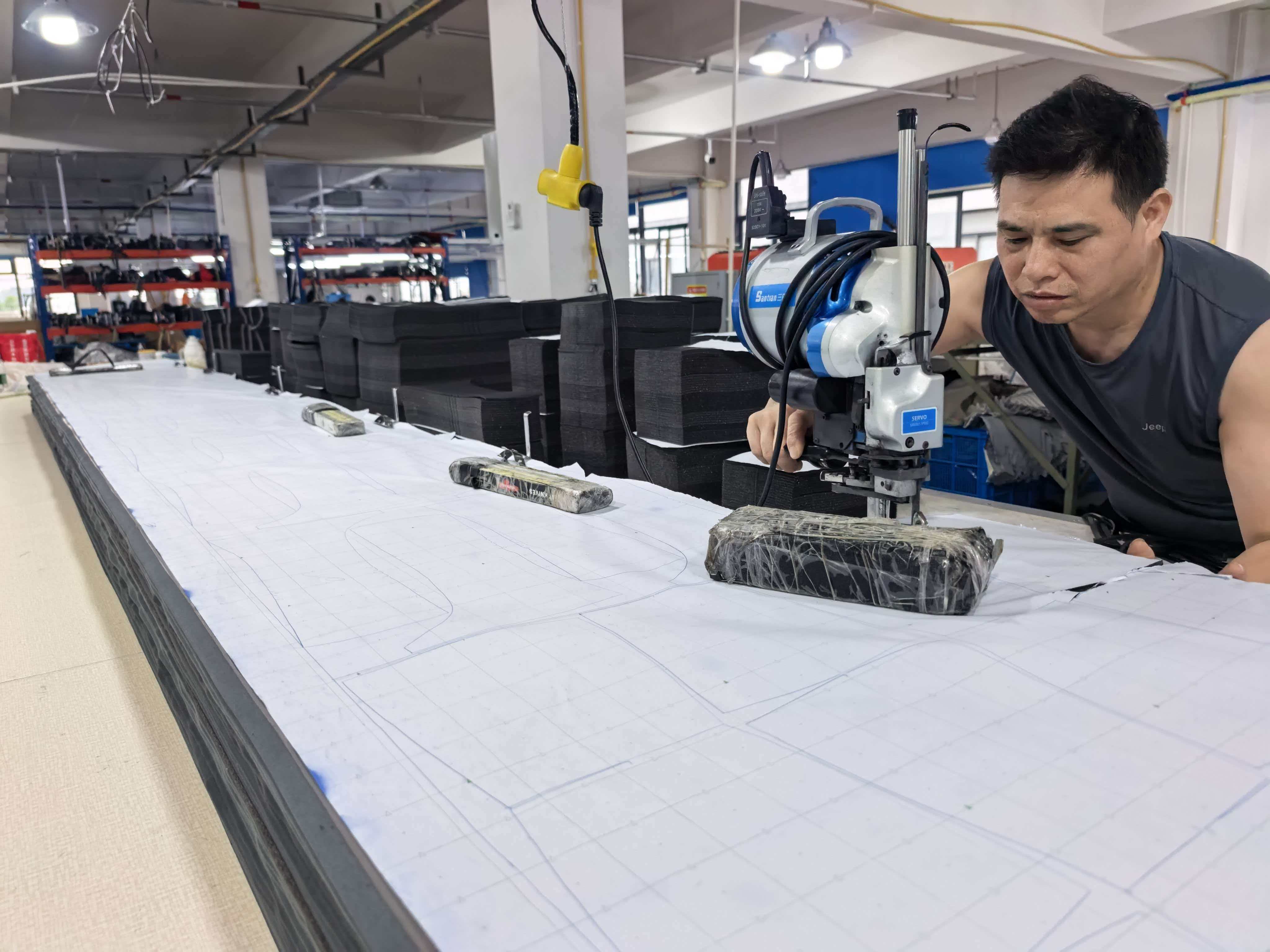 Material cutting process in the massage device workshop